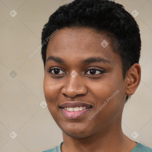 Joyful black young-adult female with short  black hair and brown eyes