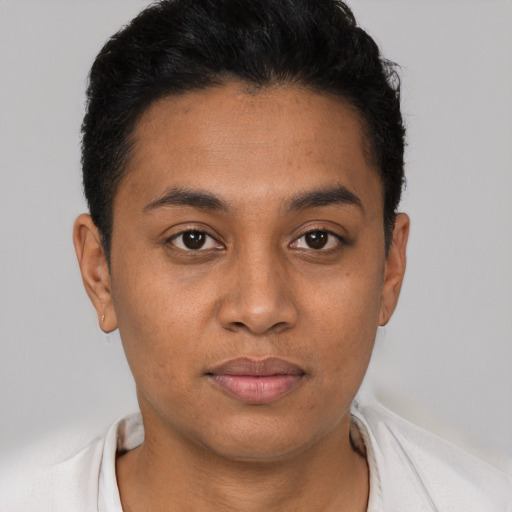 Neutral latino young-adult male with short  black hair and brown eyes