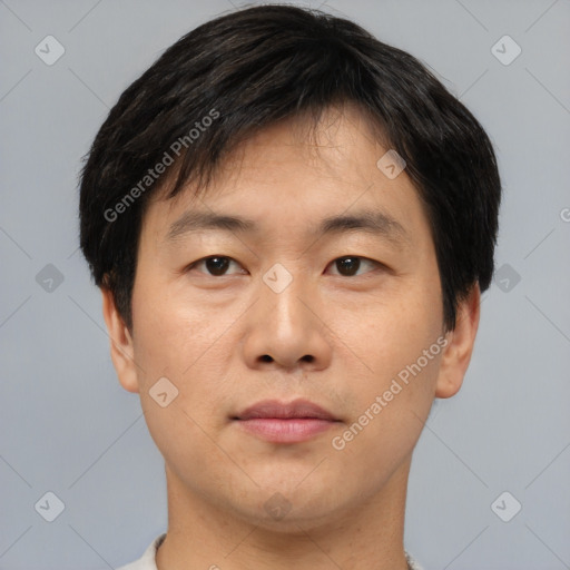 Neutral asian young-adult male with short  black hair and brown eyes