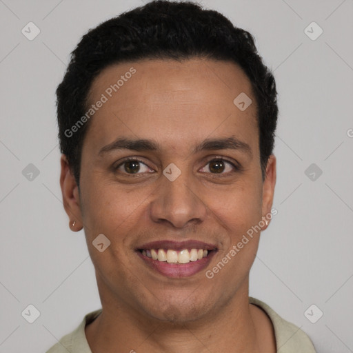 Joyful latino young-adult male with short  brown hair and brown eyes