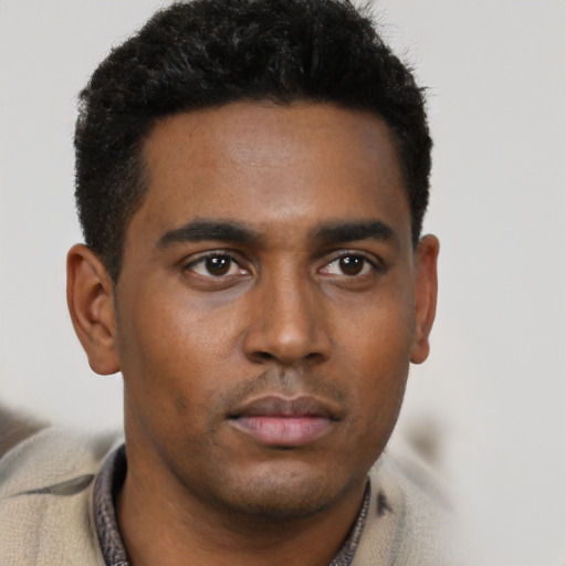 Neutral black young-adult male with short  black hair and brown eyes