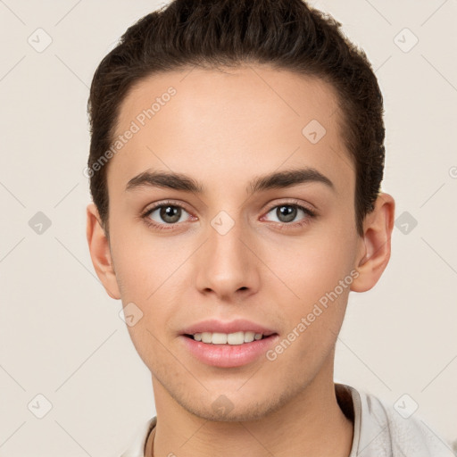 Joyful white young-adult male with short  brown hair and brown eyes