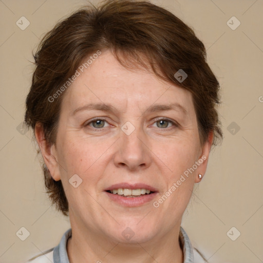 Joyful white adult female with medium  brown hair and grey eyes