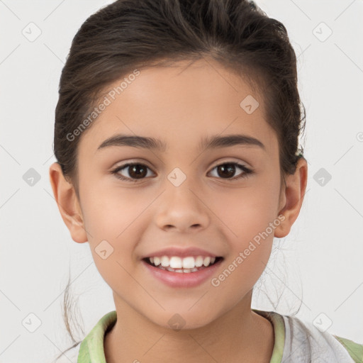 Joyful white child female with short  brown hair and brown eyes