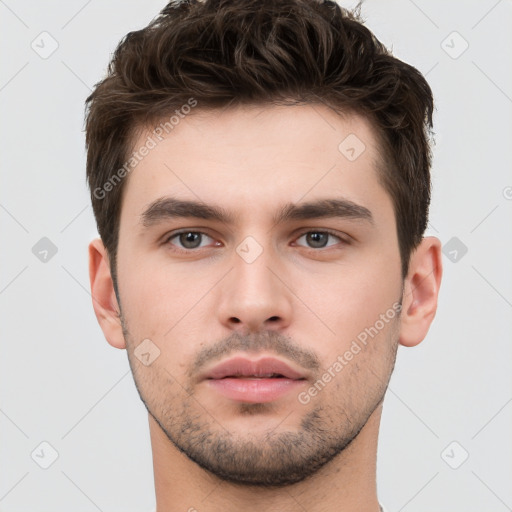 Neutral white young-adult male with short  brown hair and brown eyes