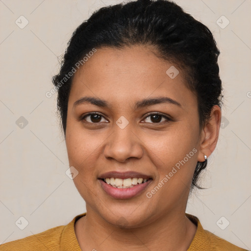 Joyful latino young-adult female with short  brown hair and brown eyes