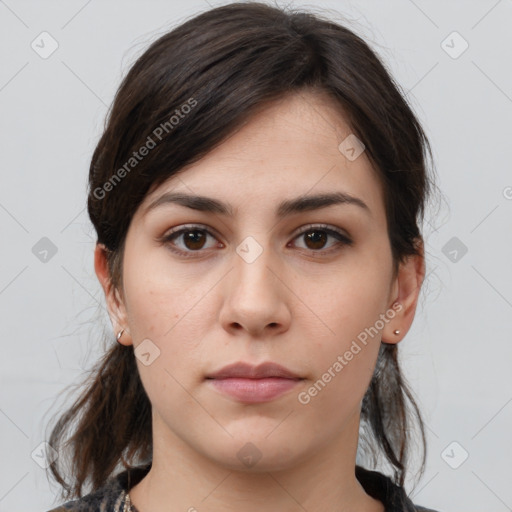 Neutral white young-adult female with medium  brown hair and brown eyes