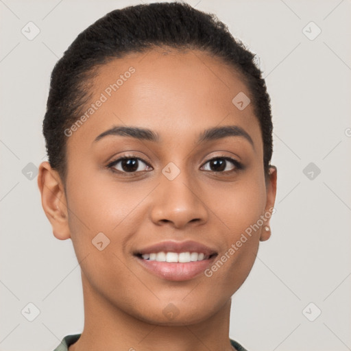 Joyful latino young-adult female with short  brown hair and brown eyes