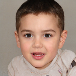 Joyful white child male with short  brown hair and brown eyes