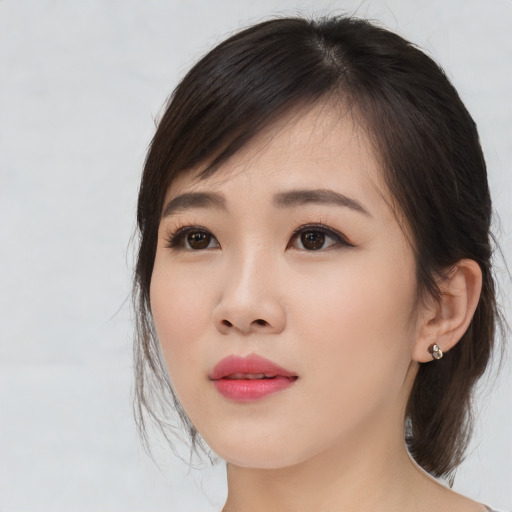 Neutral asian young-adult female with medium  brown hair and brown eyes