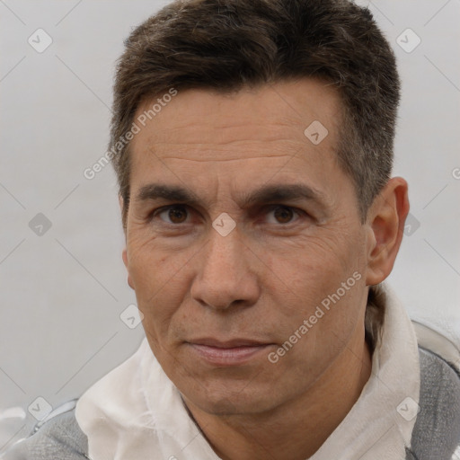 Neutral white adult male with short  brown hair and brown eyes