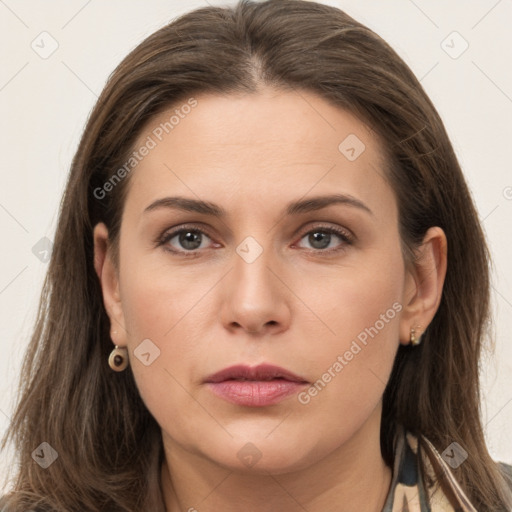 Neutral white young-adult female with long  brown hair and brown eyes