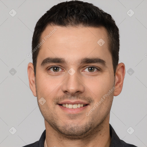 Joyful white young-adult male with short  brown hair and brown eyes