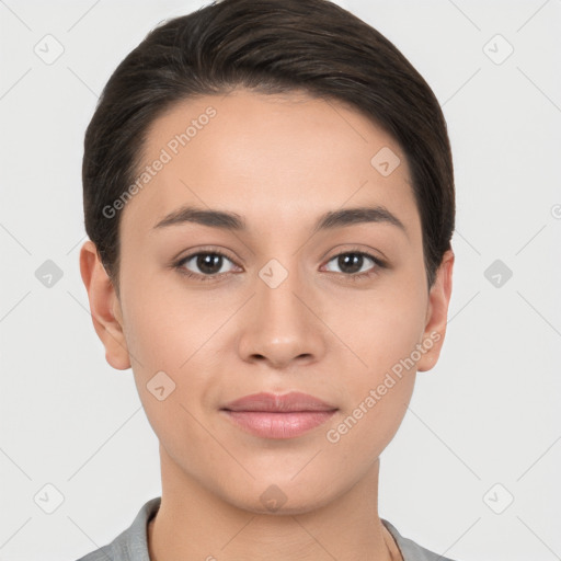 Joyful white young-adult female with short  brown hair and brown eyes