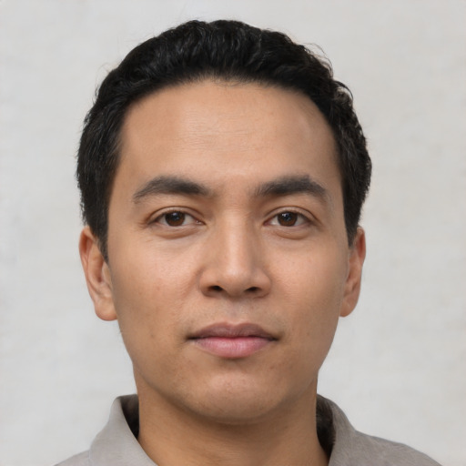 Neutral asian young-adult male with short  black hair and brown eyes