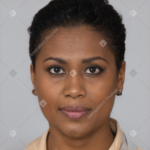 Joyful black young-adult female with short  brown hair and brown eyes