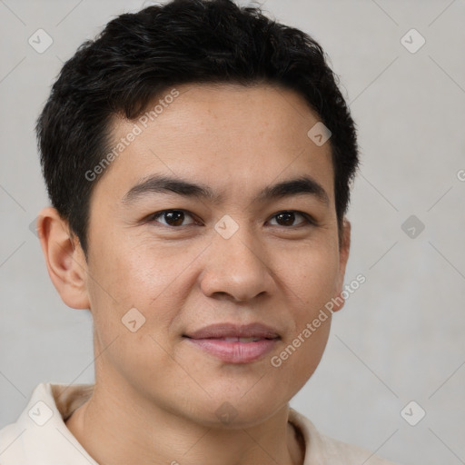 Joyful latino young-adult male with short  brown hair and brown eyes