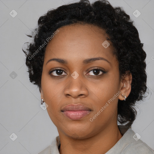 Joyful black young-adult female with medium  black hair and brown eyes