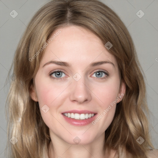 Joyful white young-adult female with medium  brown hair and blue eyes