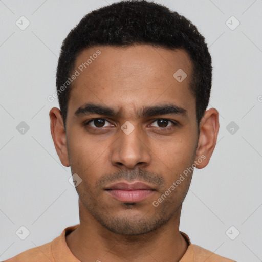 Neutral latino young-adult male with short  black hair and brown eyes