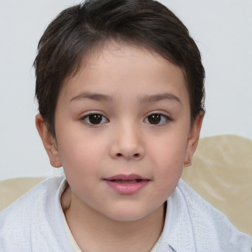 Joyful white child female with short  brown hair and brown eyes