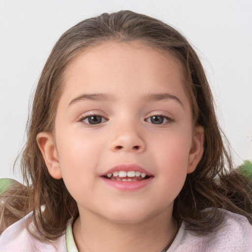 Joyful white child female with medium  brown hair and brown eyes