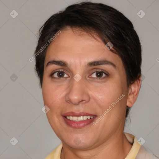 Joyful white adult female with medium  brown hair and brown eyes