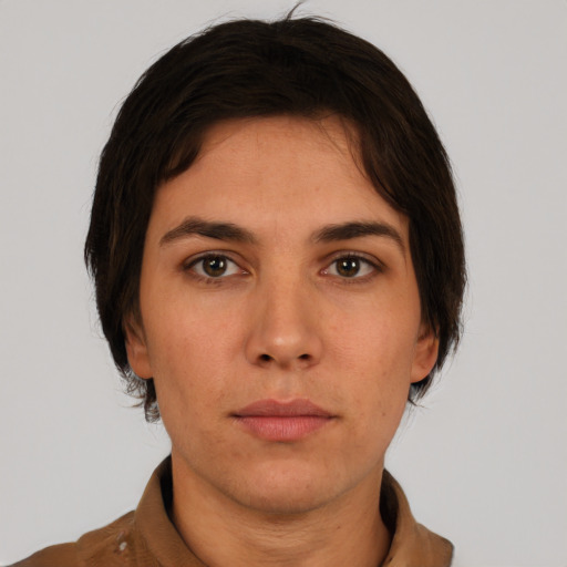 Neutral white young-adult female with short  brown hair and brown eyes