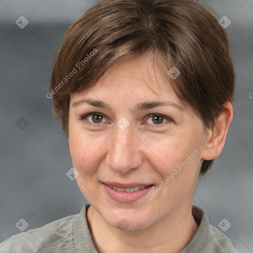 Joyful white adult female with short  brown hair and brown eyes