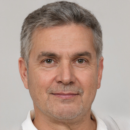 Neutral white middle-aged male with short  gray hair and brown eyes