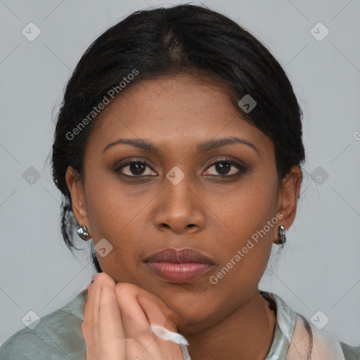 Neutral black young-adult female with medium  brown hair and brown eyes