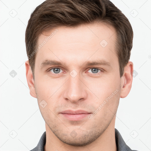 Neutral white young-adult male with short  brown hair and grey eyes