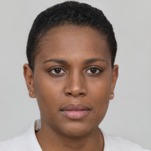 Neutral black young-adult female with short  brown hair and brown eyes