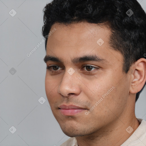 Neutral white young-adult male with short  black hair and brown eyes