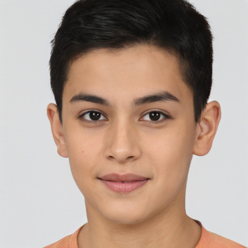 Joyful latino young-adult male with short  brown hair and brown eyes