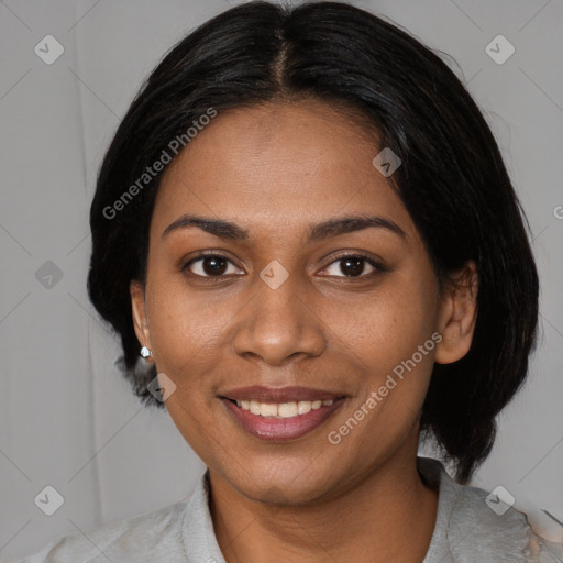 Joyful black young-adult female with medium  brown hair and brown eyes