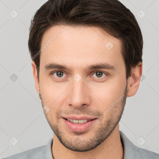 Joyful white young-adult male with short  brown hair and brown eyes