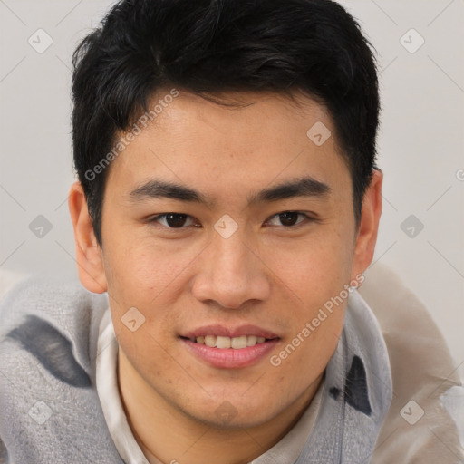 Joyful latino young-adult male with short  brown hair and brown eyes