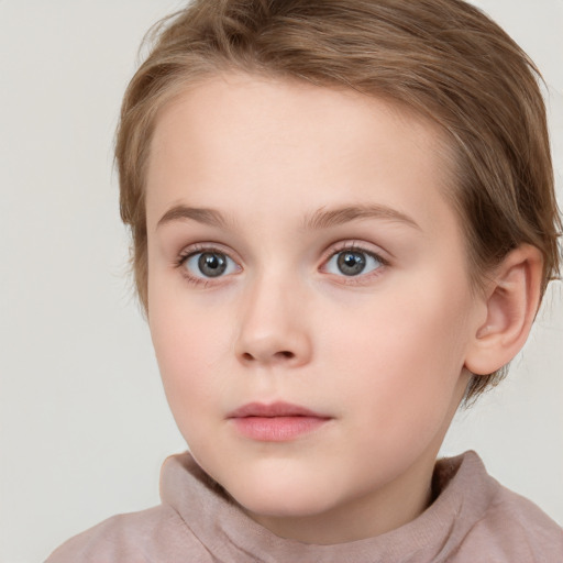 Neutral white child female with short  brown hair and grey eyes