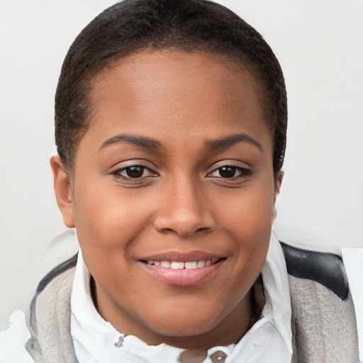 Joyful latino young-adult female with short  brown hair and brown eyes