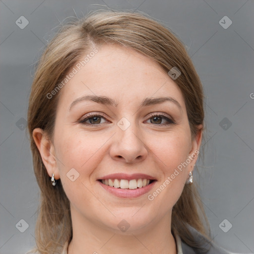 Joyful white young-adult female with medium  brown hair and grey eyes