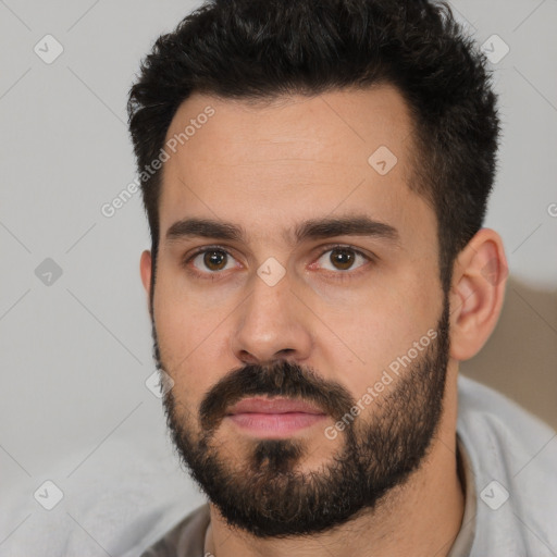 Neutral white young-adult male with short  black hair and brown eyes