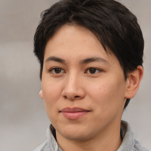 Joyful white young-adult female with short  black hair and brown eyes