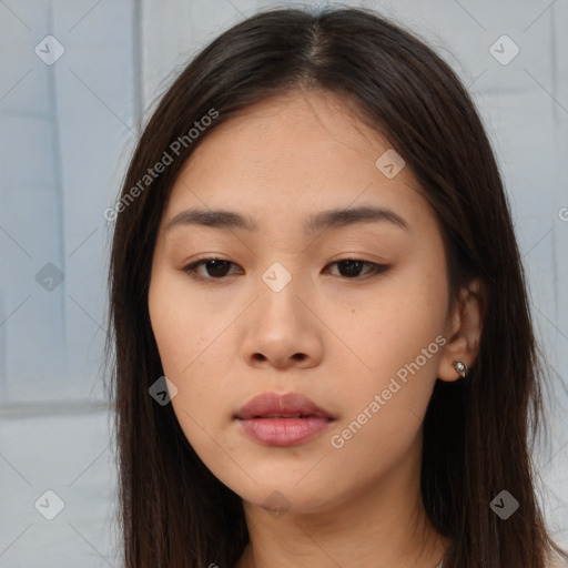 Neutral white young-adult female with long  brown hair and brown eyes