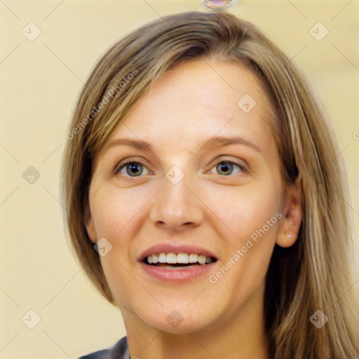 Joyful white young-adult female with long  brown hair and grey eyes