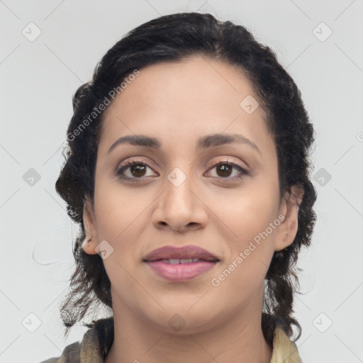 Joyful latino young-adult female with medium  brown hair and brown eyes