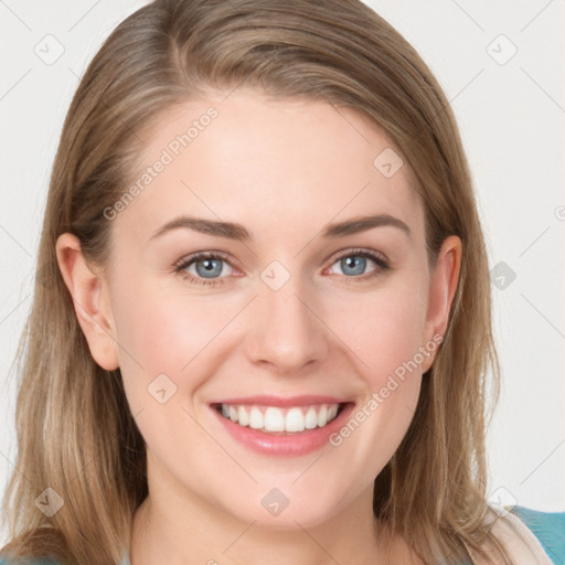 Joyful white young-adult female with medium  brown hair and blue eyes