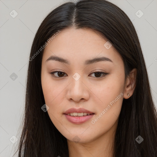 Joyful asian young-adult female with long  brown hair and brown eyes