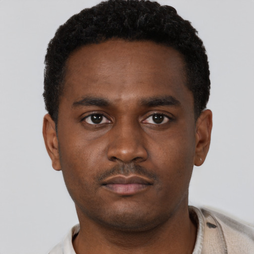Neutral latino young-adult male with short  brown hair and brown eyes