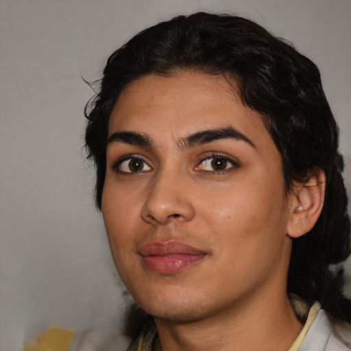 Joyful latino young-adult female with medium  black hair and brown eyes